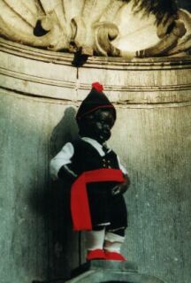 The very famous Belgian lad called "Manneken Pis", in Brussels. It is said that he saved the town from a huge fire simply by...