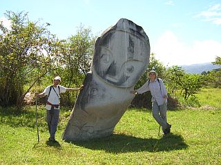 Cornelia and Fab posing with a megalith