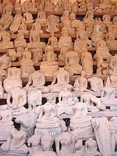 Buddha statues graveyard