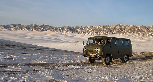 Russian minivan in the Gobi mountains