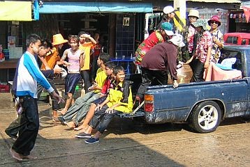 Water splashing in the streets of Phimai